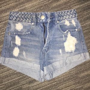 Distressed denim shorts